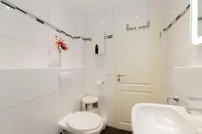 Ein Badezimmer in der Unterkunft Ferienwohnung Muschel 2