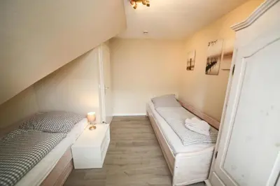 Ein Bett oder Betten in einem Zimmer der Unterkunft Ferienwohnung Ocean Pearl