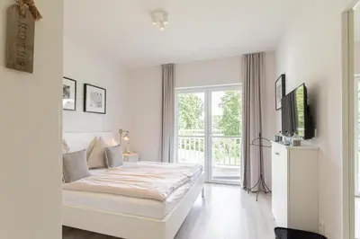 Ein Bett oder Betten in einem Zimmer der Unterkunft Ferienwohnung Pier99