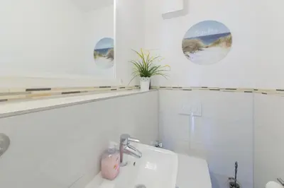 Ein Badezimmer in der Unterkunft Ferienwohnung Küstenliebe