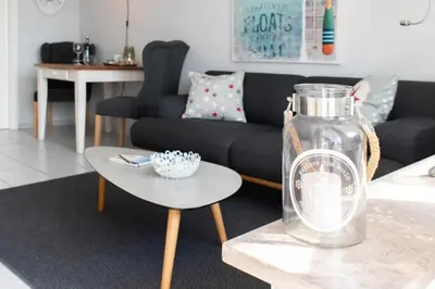 Ein Sitzbereich in der Unterkunft Ferienwohnung Heimathafen