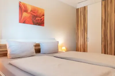 Ein Bett oder Betten in einem Zimmer der Unterkunft Ferienwohnung Seebrücke 04