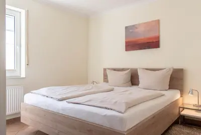 Ein Bett oder Betten in einem Zimmer der Unterkunft Ferienwohnung Seestern