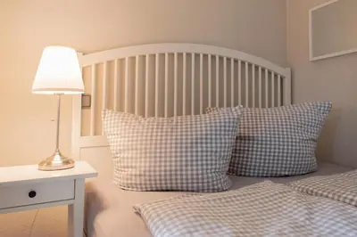 Ein Bett oder Betten in einem Zimmer der Unterkunft Ferienwohnung Seetempel App. 35