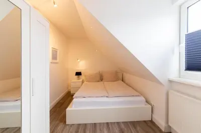 Ein Bett oder Betten in einem Zimmer der Unterkunft Ferienwohnung Sommerwind