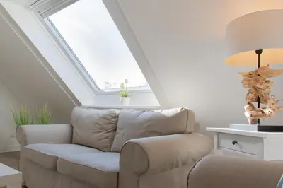 Ein Sitzbereich in der Unterkunft Ferienwohnung Strandaster