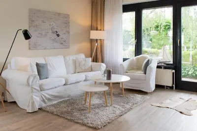 Ein Sitzbereich in der Unterkunft Ferienwohnung Strandlust