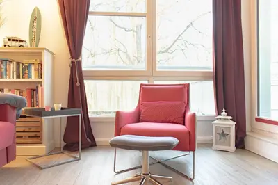 Ein Sitzbereich in der Unterkunft Ferienwohnung Stranddüne 2