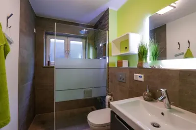 Ein Badezimmer in der Unterkunft Ferienwohnung Strandhaus Möwenberg App.12
