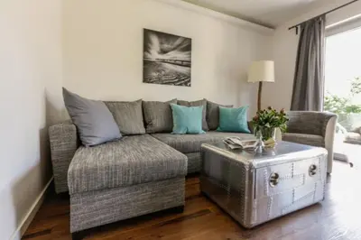 Ein Sitzbereich in der Unterkunft Ferienwohnung Strandhaus Möwenberg App.12