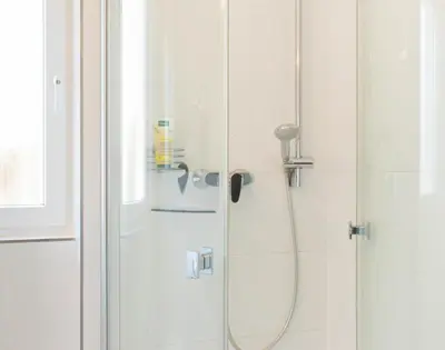 Ein Badezimmer in der Unterkunft Ferienwohnung Strandmuschel