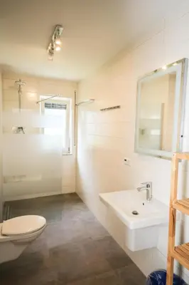 Ein Badezimmer in der Unterkunft Ferienwohnung Strandhaus Möwenberg App. 77