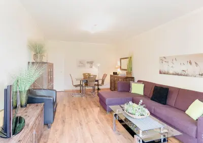 Ein Sitzbereich in der Unterkunft Ferienwohnung Strandhafer