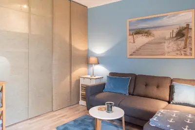 Ein Sitzbereich in der Unterkunft Ferienwohnung Strandterrasse