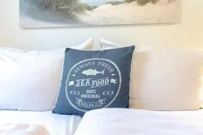 Ein Bett oder Betten in einem Zimmer der Unterkunft Ferienwohnung Strandläufer