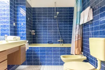 Ein Badezimmer in der Unterkunft Ferienwohnung Strandhotel