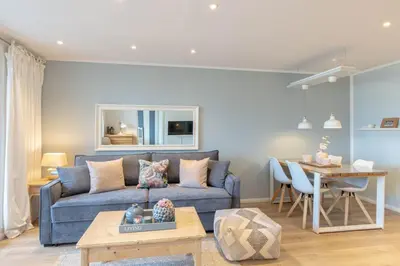 Ein Sitzbereich in der Unterkunft Ferienwohnung Strandvilla Augustusbad App. 18