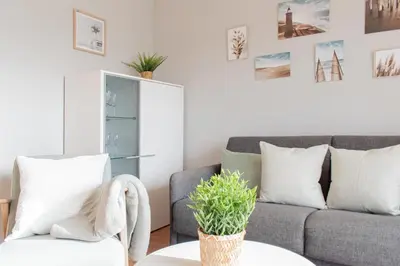 Ein Sitzbereich in der Unterkunft Ferienwohnung Stranddüne B 13