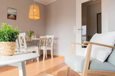 Ein Sitzbereich in der Unterkunft Ferienwohnung Stranddüne B 13