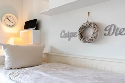 Ein Bett oder Betten in einem Zimmer der Unterkunft Ferienwohnung Sunshine Beachhouse 111