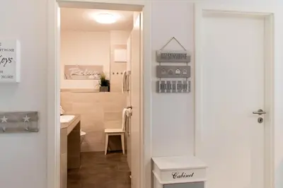 Ein Badezimmer in der Unterkunft Ferienwohnung Sunshine Beachhouse 111