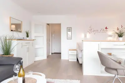 Ein Sitzbereich in der Unterkunft Ferienwohnung Viva La Vida