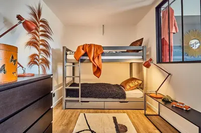 Ein Bett oder Betten in einem Zimmer der Unterkunft Ferienwohnung Sundown