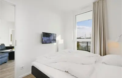 Ein Bett oder Betten in einem Zimmer der Unterkunft Highend Travemünde - Whg 308