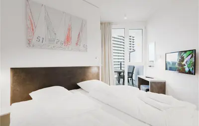 Ein Bett oder Betten in einem Zimmer der Unterkunft Highend Travemünde - Whg 609