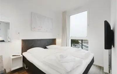 Ein Bett oder Betten in einem Zimmer der Unterkunft Highend Travemünde - Whg 609
