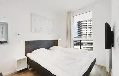 Ein Bett oder Betten in einem Zimmer der Unterkunft Highend Travemünde - Whg 411