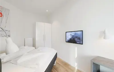 Ein Bett oder Betten in einem Zimmer der Unterkunft Highend Travemünde - Whg 505