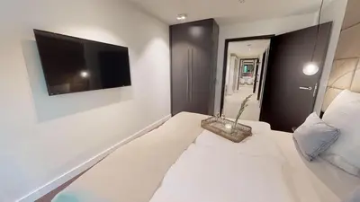 Ein Bett oder Betten in einem Zimmer der Unterkunft White Pearl Apartment 2.07