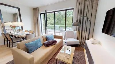 Ein Sitzbereich in der Unterkunft White Pearl Apartment 4 02
