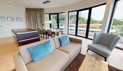 Ein Sitzbereich in der Unterkunft White Pearl Apartment 4 05