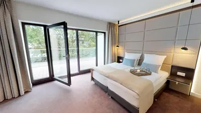 Ein Bett oder Betten in einem Zimmer der Unterkunft White Pearl Apartment 3.08