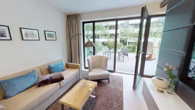 Ein Sitzbereich in der Unterkunft White Pearl Apartment 0.13