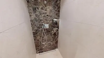 Ein Badezimmer in der Unterkunft White Pearl Apartment 0.13