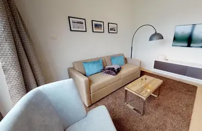 Ein Sitzbereich in der Unterkunft White Pearl Apartment 4.03