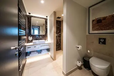 Ein Badezimmer in der Unterkunft White Pearl Apartment 2.01