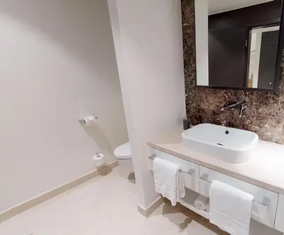 Ein Badezimmer in der Unterkunft White Pearl Apartment 0.05