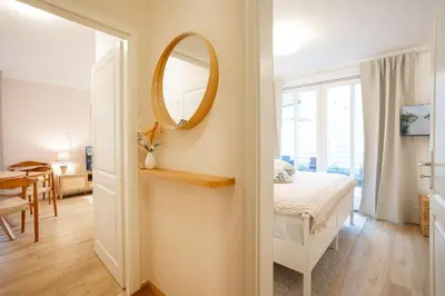 Ein Bett oder Betten in einem Zimmer der Unterkunft (ARW3) - Ferienwohnung Kossmann