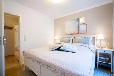 Ein Bett oder Betten in einem Zimmer der Unterkunft (ARW3) - Ferienwohnung Kossmann