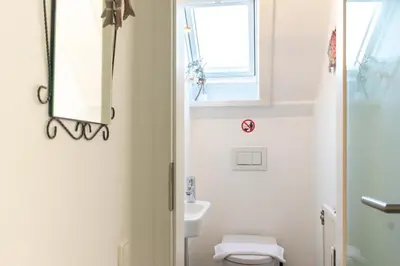 Ein Badezimmer in der Unterkunft Ferienwohnung Viermaster