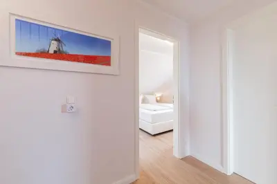 Ein Bett oder Betten in einem Zimmer der Unterkunft Ferienwohnung dat Seepeerdje