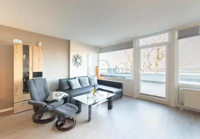 Ein Sitzbereich in der Unterkunft Ferienwohnung Strandhotel App. 105