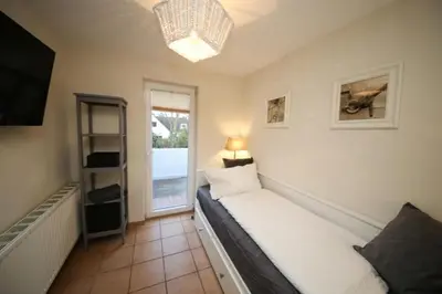 Ein Bett oder Betten in einem Zimmer der Unterkunft Ferienwohnung Hansa Lounge 20