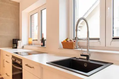 Küche/Küchenzeile in der Unterkunft Ferienwohnung Hafenkante
