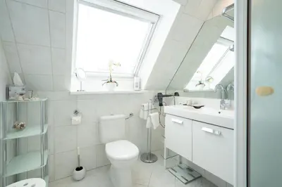 Ein Badezimmer in der Unterkunft Ferienwohnung Birkenallee 55