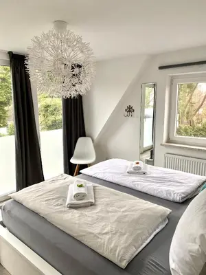 Ein Bett oder Betten in einem Zimmer der Unterkunft BUDE 17